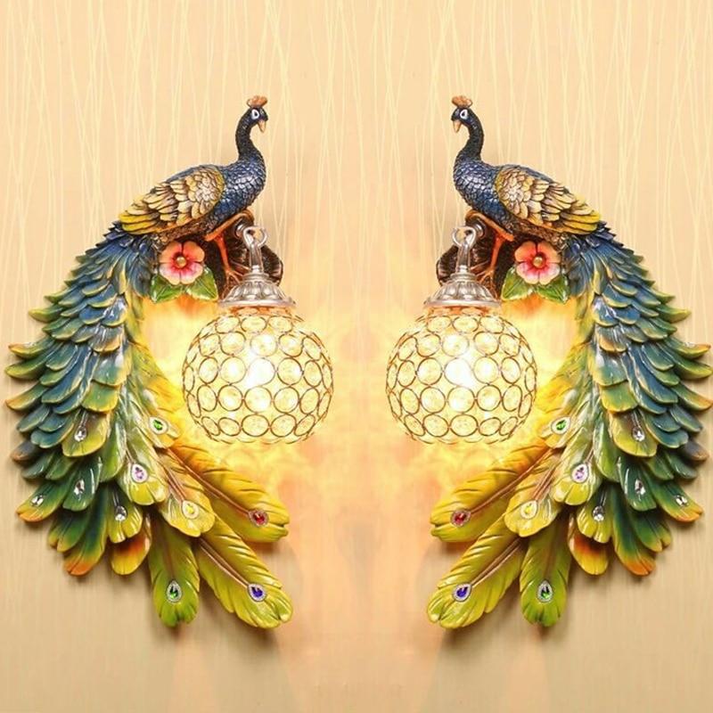 https://www.avenila.com/cdn/shop/products/bohemian-peacock-luxury-led-crystal-wall-lamp-938437.jpg?v=1577149056